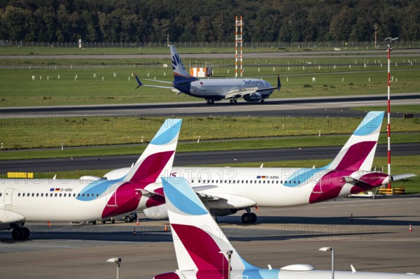Düsseldorf Airport, Sunexpress Boeing 737 after landing, Eurowings Airbus aircraft in parking