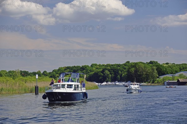 Europe, Germany, Mecklenburg-Western Pomerania, motor yacht on the Elde-Müritz waterway, Malchow,