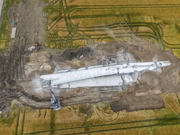 Demolished tower of a 20 year old wind turbine, in the Werl wind farm, 5 old Enercon E-66 turbines
