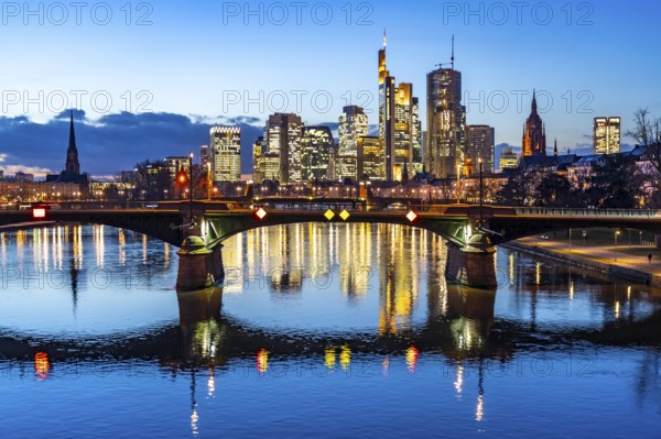 Skyline of the city centre of Frankfurt am Main, river Main, dusk, Ignatz-Bubis-Brücke, Hesse,