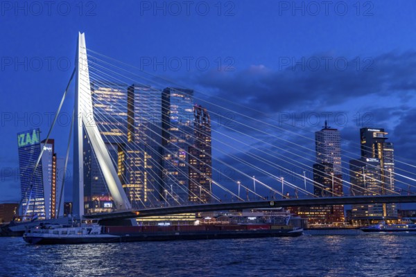 The skyline of Rotterdam, with the Erasmus Bridge over the Nieuwe Maas, skyscrapers in the Kop van