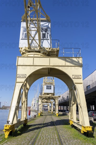 Harbour cranes on the Scheldekai, the world's largest collection of historic cranes, are part of