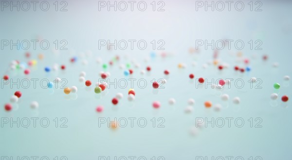 Colourful nonpareils, sugar pearls, sprinkle decorations in bright colours, mini sugar balls for
