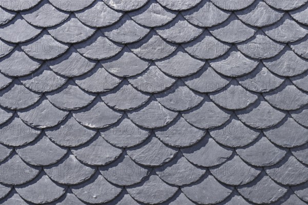 Facade clad with natural slate, covering with special fish scales, Wilnsdorf. North