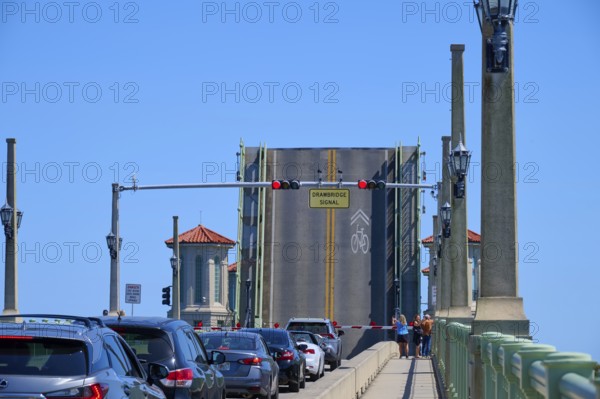 Traffic light, drawbridge and cars, with a sign, Bridge of Lions and raised bridge, St. Augustine,