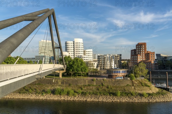 Bridge at the Media Harbour and the New Customs Yard with the Gehry buildings by architect and