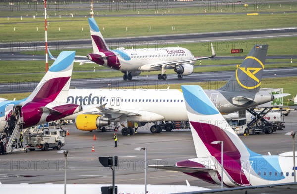 Düsseldorf Airport, Eurowings and Condor aircraft on the apron, on the taxiway to take-off,