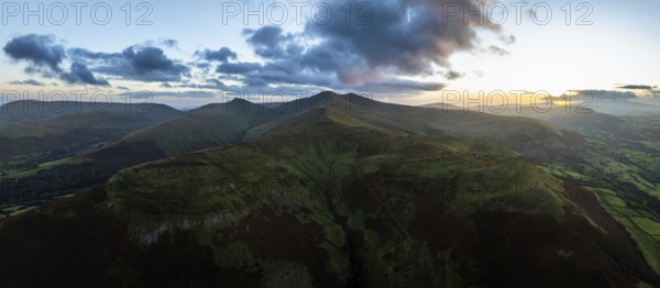 Panorama of Sunset over Pen y Fan and Cribyn from a drone, Brecon Beacons National Park, Wales,