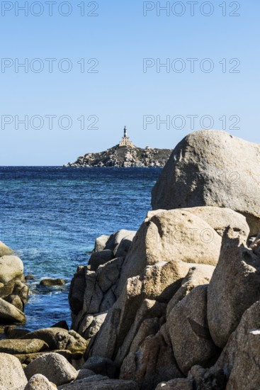 Lighthouse and rocks, Capo Carbonara, Villasimius, south coast, Sardinia, Italy, Europe