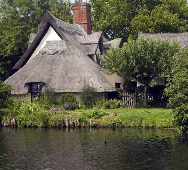 Thatched Bridge Cottage at Flatford, East Bergholt, Suffolk, England, United Kingdom, Europe