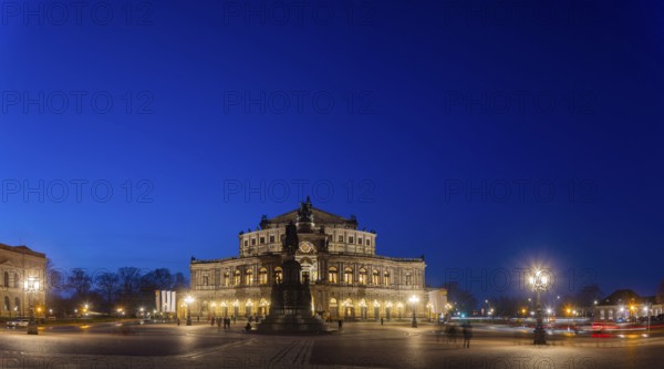 Semperoper am Theaterplatz with King Johann monument in the evening, Dresden, Saxony, Germany,