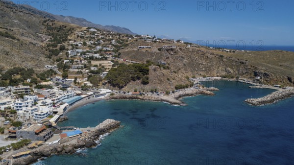 Aerial view of bay with harbour of Chora Sfakion on the south coast of Crete Libyan Sea