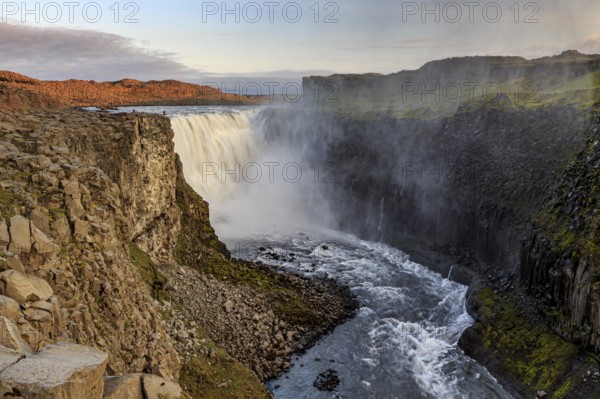 Large waterfall in a gorge, spray, rapids, summer, midnight sun, Dettifoss, North Iceland, Iceland,