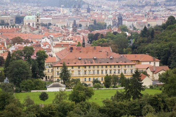 Prague Castle district skyline and buildings with traditional terracotta ceramic tiled rooftops