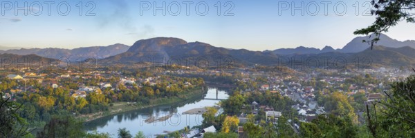 Panorama over Luang Prabang with Nam Khan River and Wat Phol Pao in the background, Laos, Asia