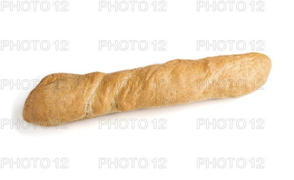 Fresh golden baguette with sesame seeds isolated on white background. side view, close up