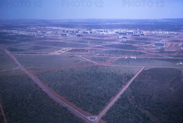 Aerial view of buildings, street network and city map, Brasilia, Federal District, Brazil, 1962,