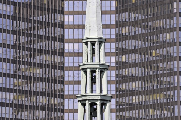 Top of Essen Cathedral, with the town hall behind it. With a height of 106 metres and 69, 000