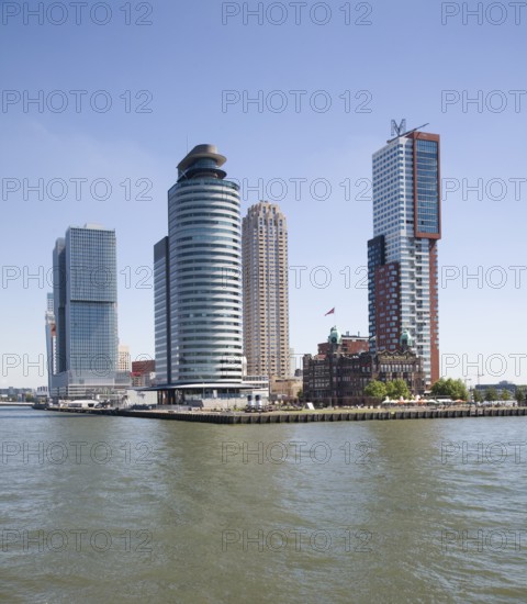 Historic Hotel New York building dwarfed by modern skyscrapers, Rotterdam, Netherlands
