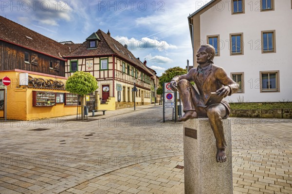Joseph Victor von Scheffel monument and Bahnhofstrasse in Bad Staffelstein, Bavaria, Germany,