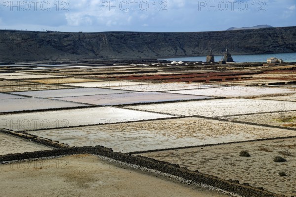 Sea salt extraction, Janubio salt flats, Salinas de Janubio, Lanzarote, Canary Islands, Canary