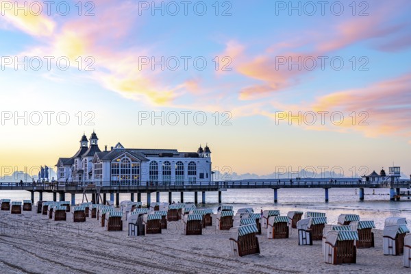 The pier of Sellin, evening mood, sunset, 394 metres long, with restaurant, jetty, beach chairs,