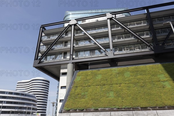 Green façade on the PEC office building, cloud bow, planting to improve the climate, Düsseldorf