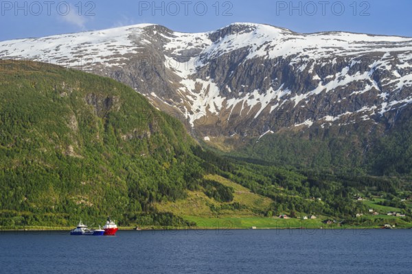 Mountains and Fjord over Norwegian Village, Olden, Innvikfjorden, Norway, Europe