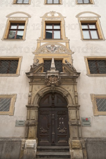 Entrance portal with the alegories of Faith and Peace from the Baroque town hall from 1661,