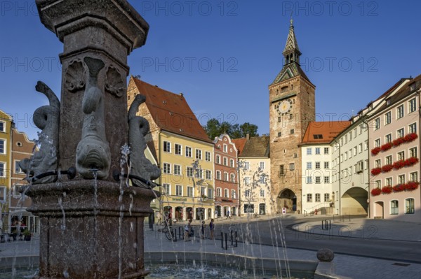 Medieval gate tower, Schmalzturm town gate or beautiful tower, baroque sculptures as gargoyles,