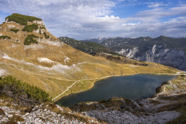 Lake Augstsee and the Atterkogel mountain on the Loser. View of other mountains. Autumn, good