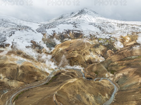 Steaming hot springs and colourful rhyolite mountains, aerial view, Hveradalir geothermal area,
