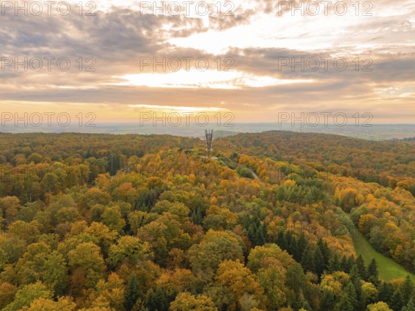 Sweeping view over autumn forest under a cloudy sky with horizon, Schönbuchturm, Herrenberg,