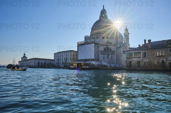 View from a gondola on 'Basilica the Santa Maria della Salute' next to Canal Grande' in Venice on a