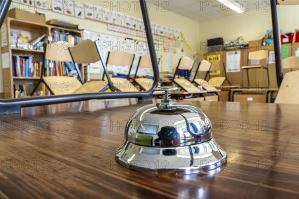 Classroom of a fourth grade, after school, the building is older but in good condition, break bell