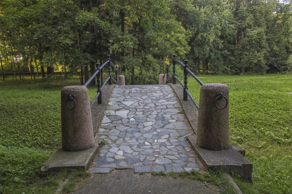 Old stone bridge in the park. Belarus
