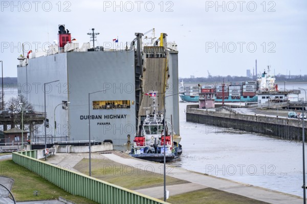 North lock in the overseas harbour of Bremerhaven, the vehicle transporter Durban Highway, under