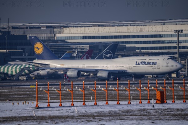 Aircraft on the taxiway at Frankfurt FRA airport, Fraport, in winter, Hesse, Germany, Europe