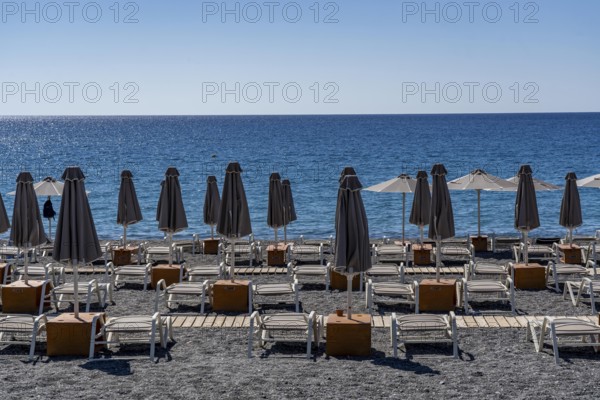 Beach, empty, organised, with sun loungers and parasols, catering, bay at Koutsounari Beach, on the
