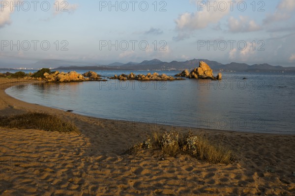 Lonely beach with granite rocks, sunrise, Spiaggia Poltu Manzu, Capo Ceraso, near Olbia, Sardinia,