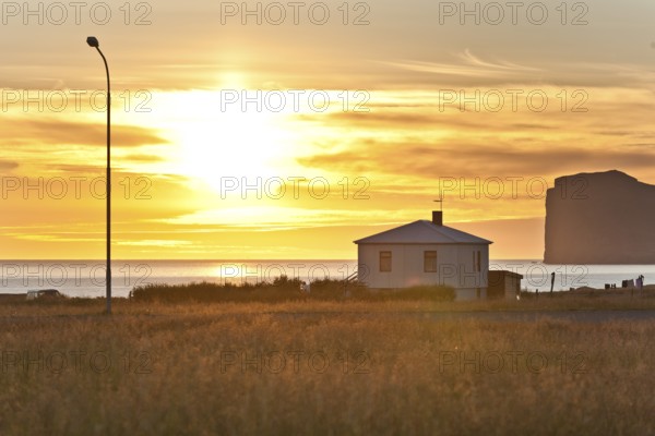 House, coast, midnight sun, Hofsos or Hofsós, Skagafjörður, Norðurland, Iceland, Europe