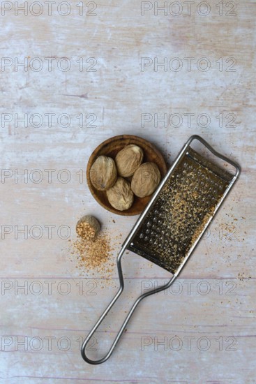 Nutmegs and grater, Myristica fragrans
