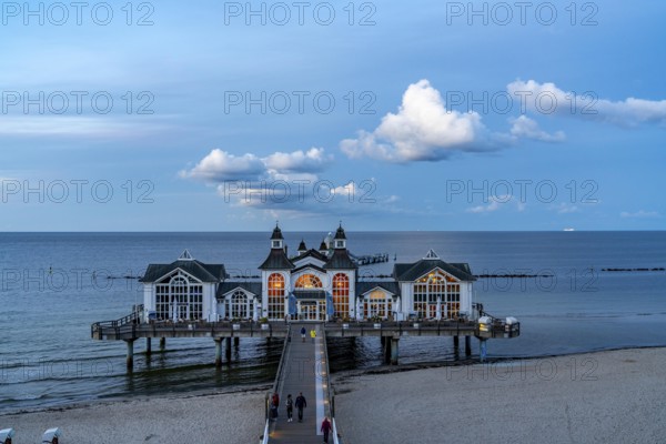 The pier of Sellin, evening mood, sunset, 394 metres long, with restaurant, jetty, beach chairs,