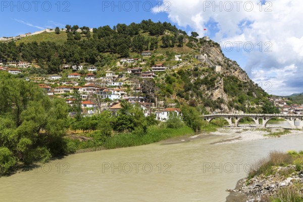 View including Berat Castle and Ottoman period Gorica bridge crossing River Osum, Berat, Albania,