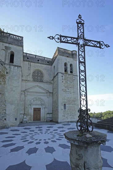 Gothic church Saint-Sauveur with historic city wall and cross, metal cross, floor, pattern, floor