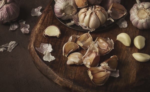 Fresh garlic, on a dark background, top view, food concept