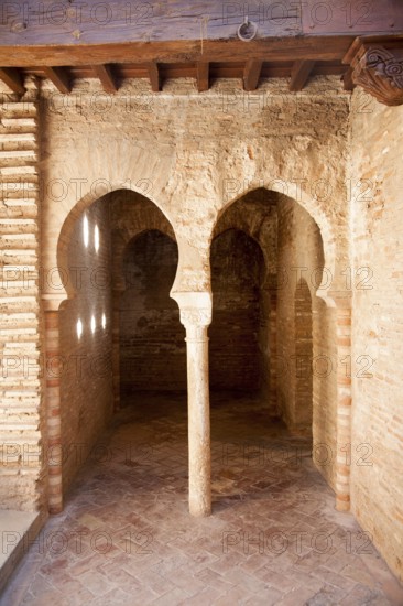 Moorish arches and decoration in the Mosque Baths of the Alhambra complex, Granada, Spain, Europe