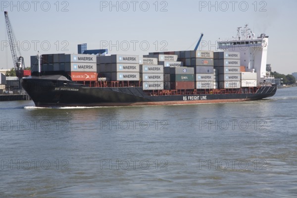 Heavily laden container ship 'BG Rotterdam' on the River Maas, Port of Rotterdam, Netherlands