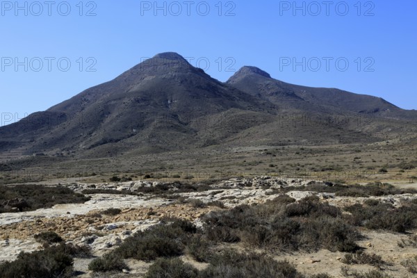 Los Frailes volcanoes from Los Escullos, Cabo de Gata national park, Almeria, Spain, Europe