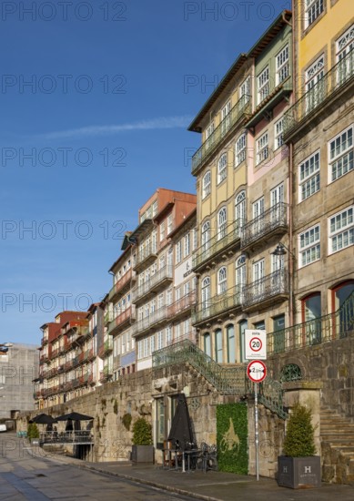 Colorful facades of houses along Cais da Estiva in the Ribeira district, Porto, Portugal, Europe